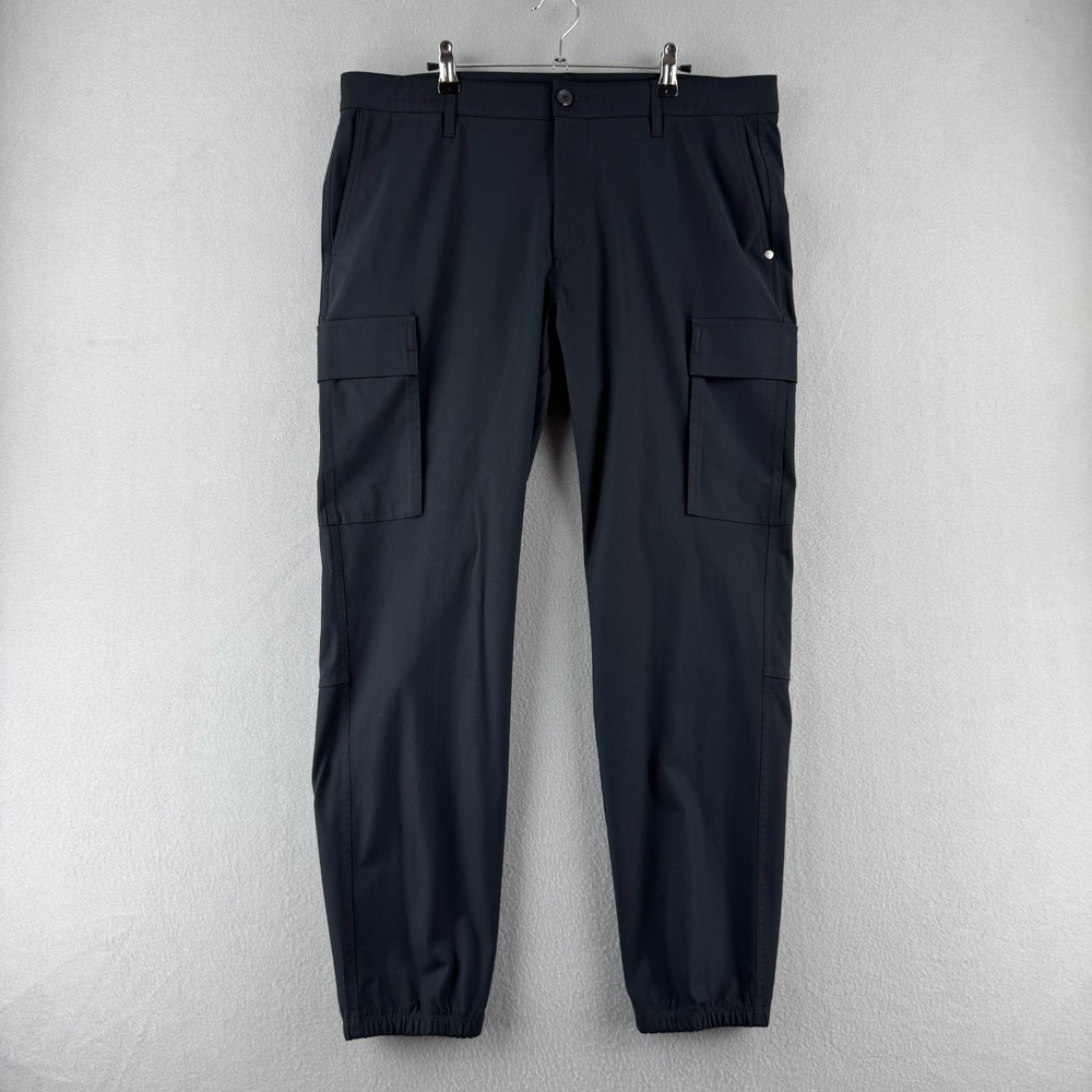 Vuori Meta Pants Mens 36 Black Cargo Jogger Performance Flex Athleisure